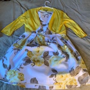 I’m selling a floral yellow knee length dress.